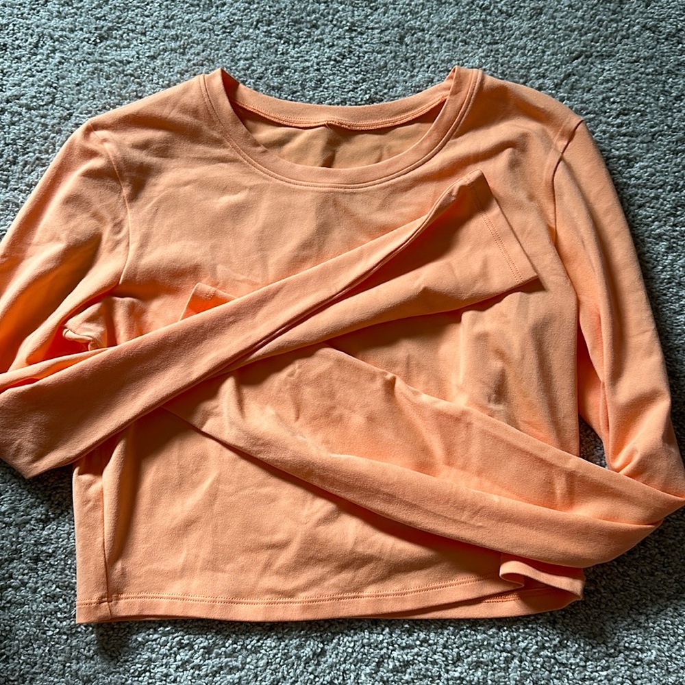 Alo Alosoft Crop Finesse Long Sleeve in coral. Color is not currently for sale!